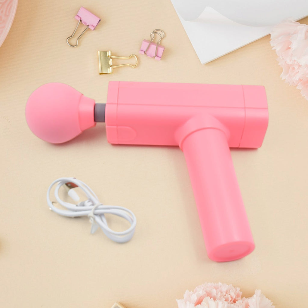 Velvet Wellness Massage Gun for deep muscle relief, highlighting its USB charging port