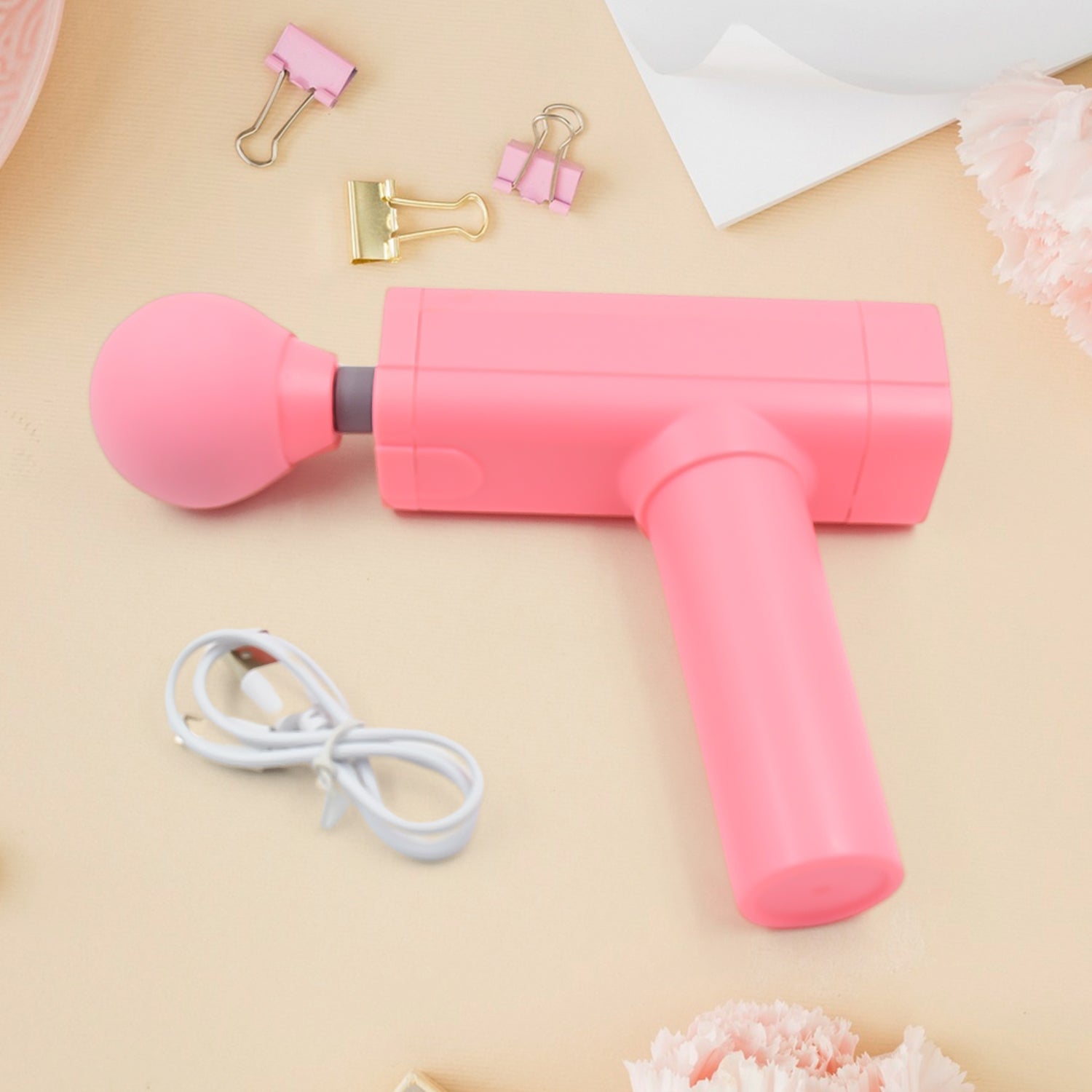 Velvet Wellness Massage Gun for deep muscle relief, highlighting its USB charging port