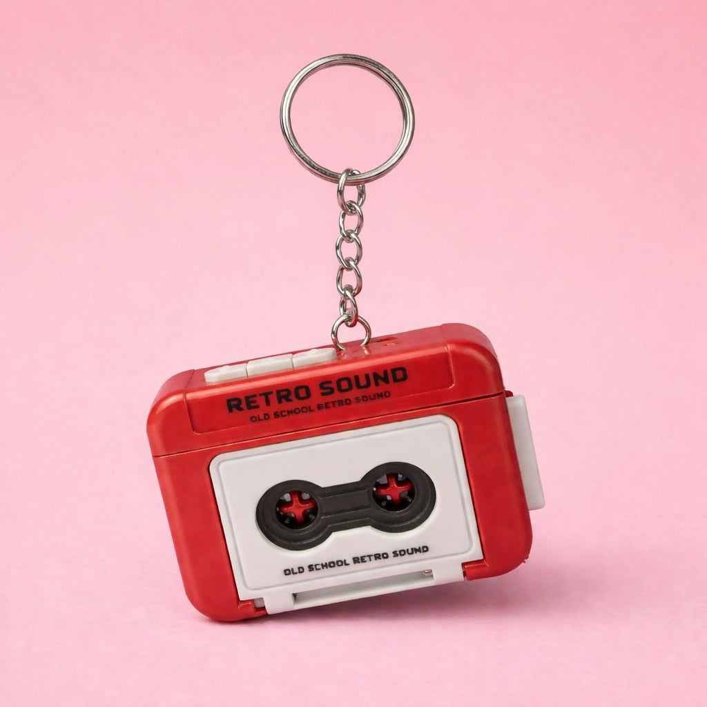 Close-up of retro cassette tape keychain with clickable buttons